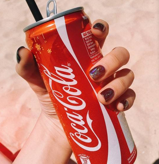 Why is milk in gallons but Coca-Cola is bottled in litres?
